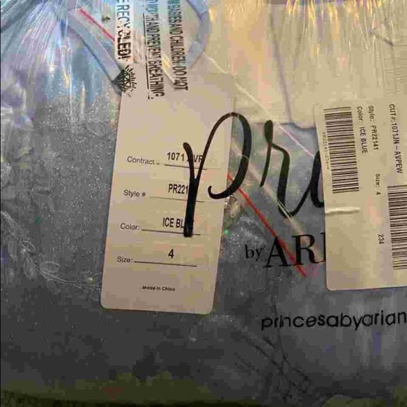 Dress she Never wore. It’s still in plastic and Box. The color is Ice Blue - Picture 4 of 6